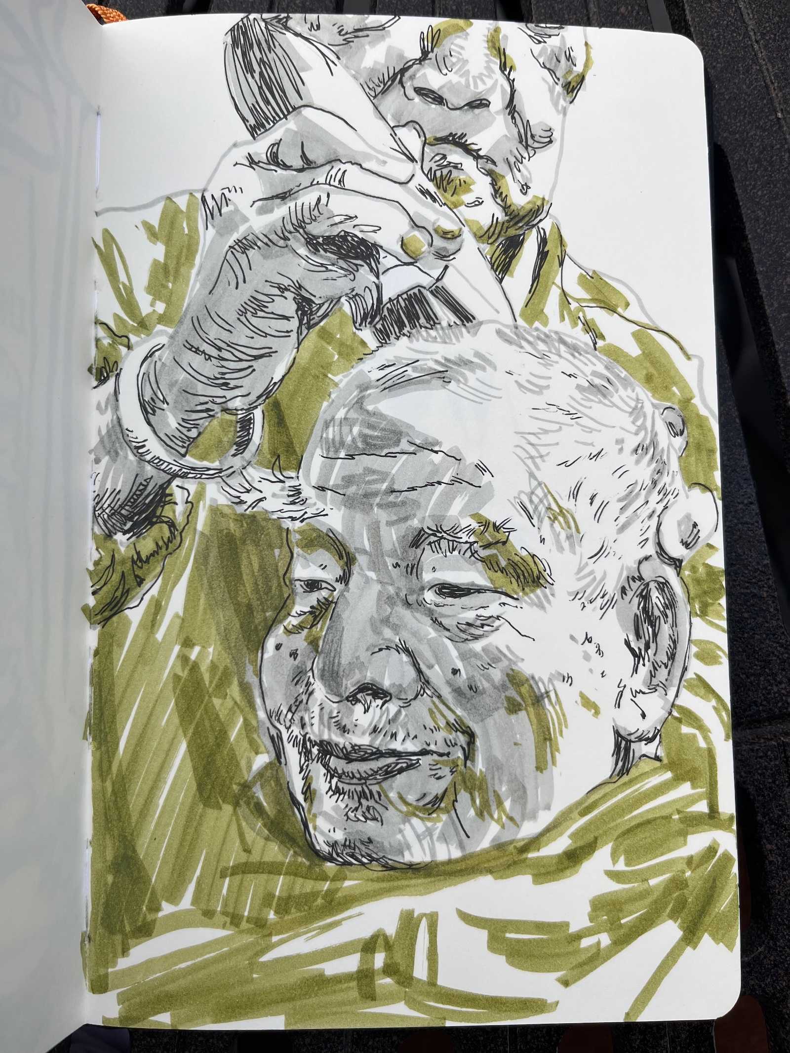 A sketch of a person getting a haircut in pen and marker.