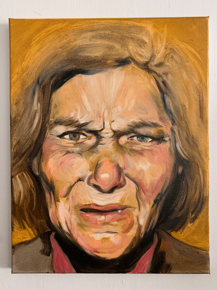 A painting of a woman's face, making a pained expression.